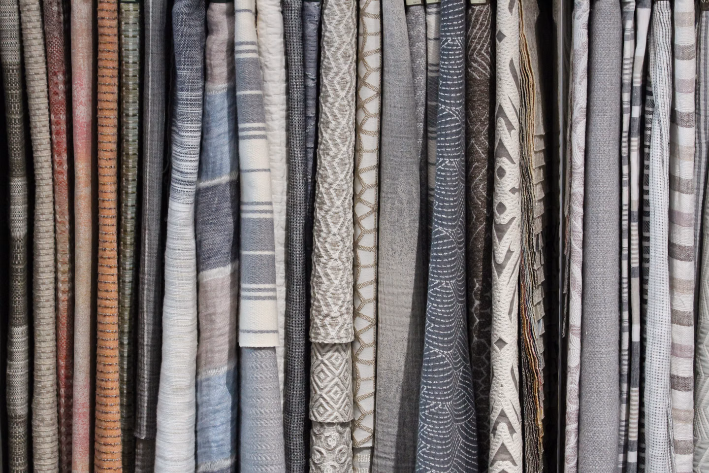 Examples of Martinelli Ginetto Fabrics side by side showing the variety of colors and textures available.