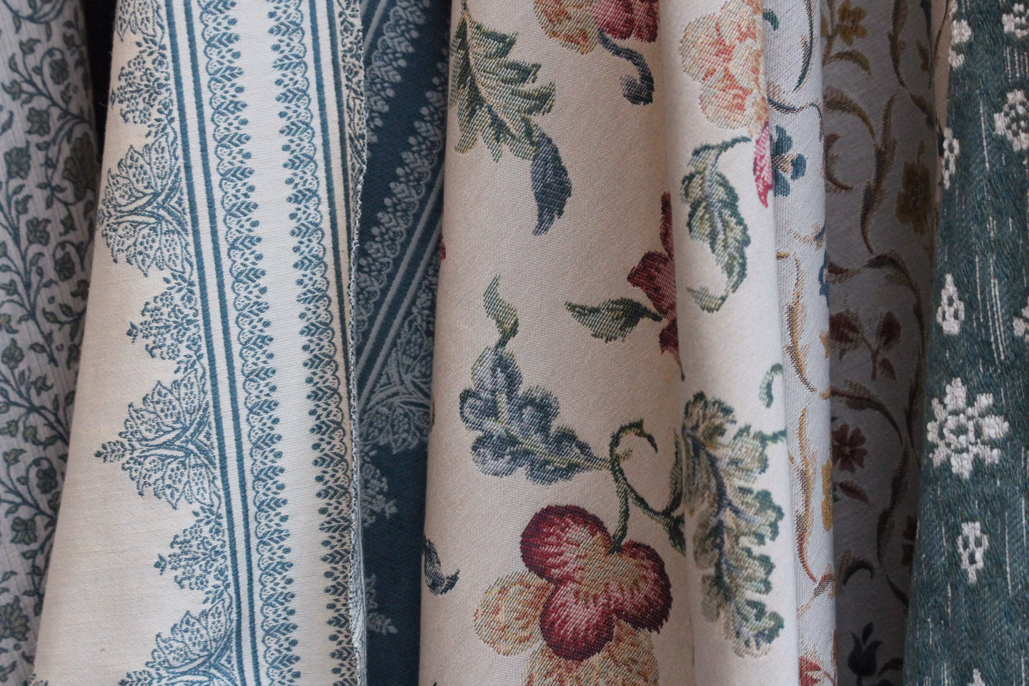 Examples of David Walters Fabrics side by side showing different patterns, designs, and colors.