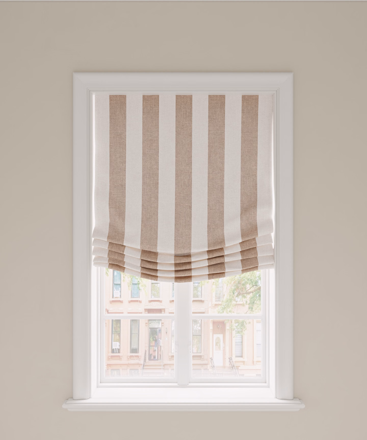 A relaxed Roman shade with vertical stripes
