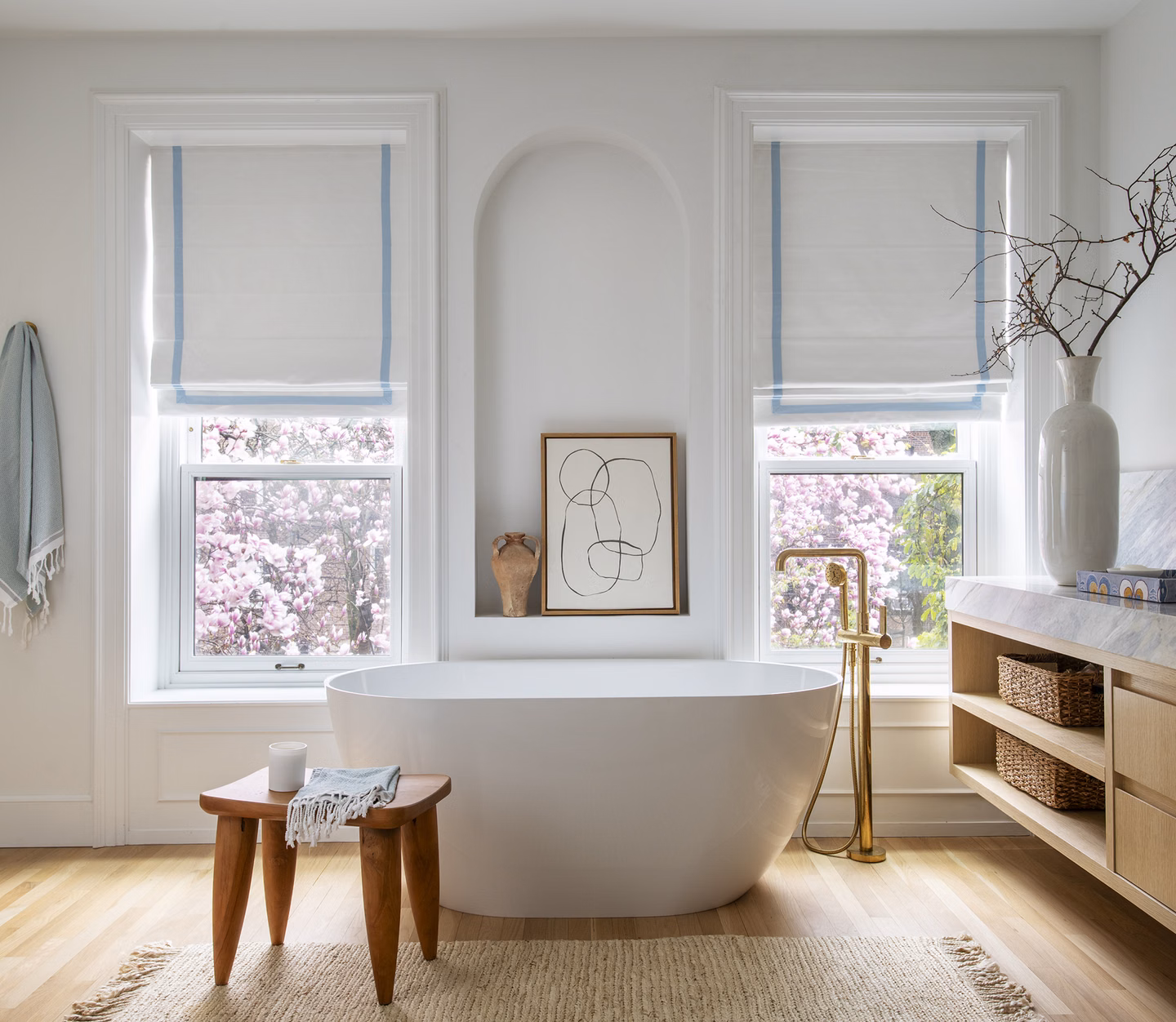 Striped Roman shades in a bathroom